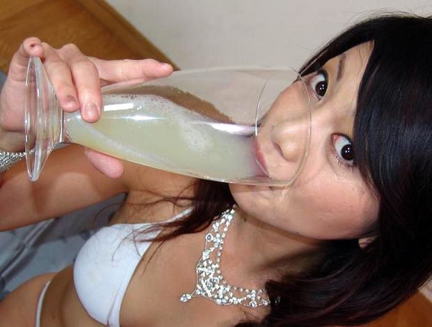 Asian Porn Photo - Asian is drinking a large glass of cum.